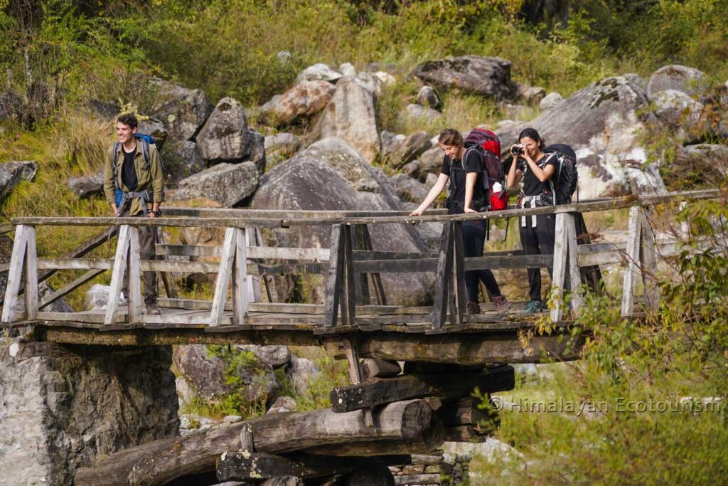 A bridge crossing on the Tirthan river during Rolla trek