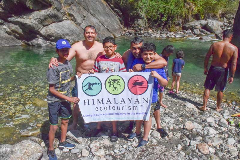 Swimming in the Tirthan river